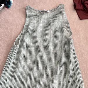 Knit sage colored cover up with tassels